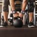 Close up photo of man strength workout training with dumbbells