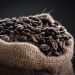 shallow focus photography of coffee beans in sack