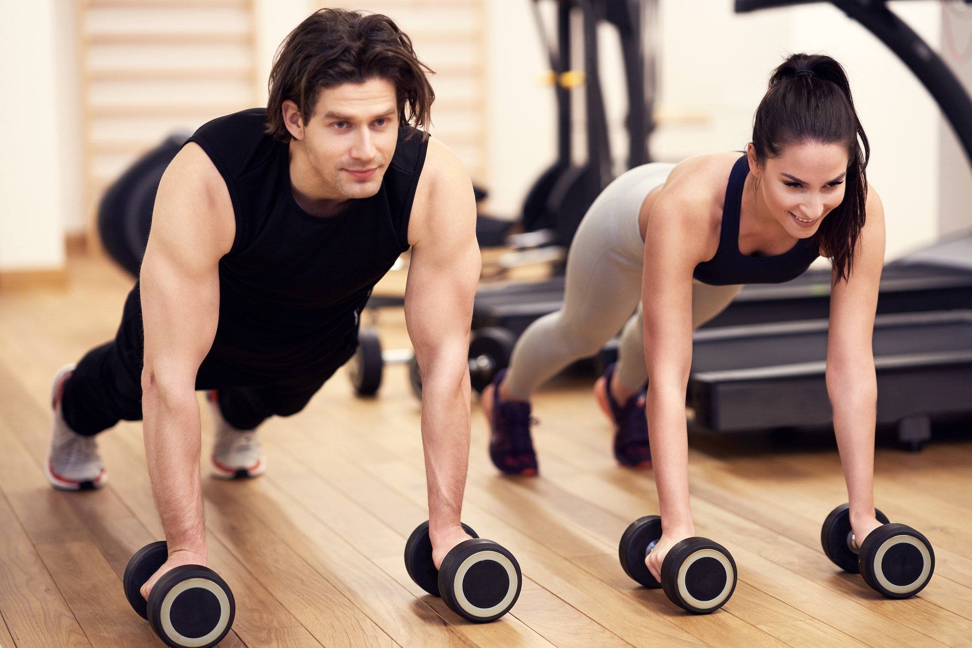 Fit couple at the gym looking very attractive