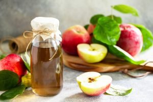 Apple vinegar. Healthy organic food. A bottle of apple cider vinegar. Photo nominated.