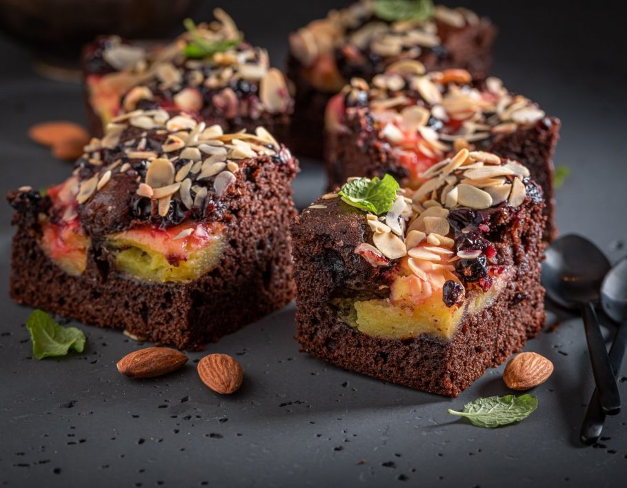 Tasty and sweet brownie with chocolate and fruits.