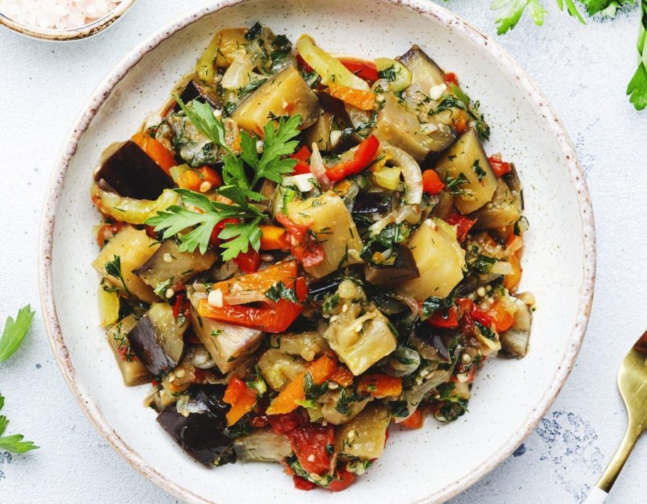 Vegetable stew, saute or caponata. Stewed eggplant with paprika, tomatoes, spices