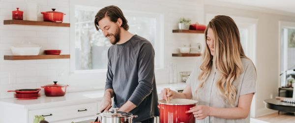 man and woman on kitchen
